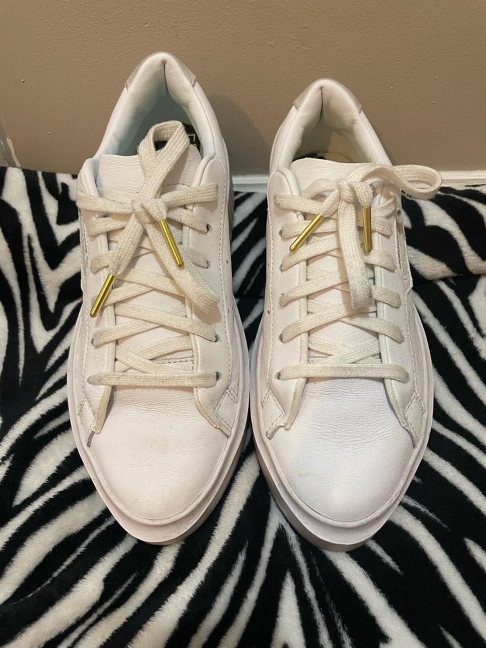 Adidas Sleek White Leather Sneakers with Gold Metal Lace Tips